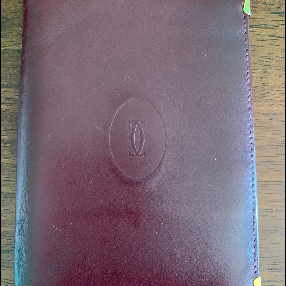 Cartier wallet with 6 credit card/bills holder.